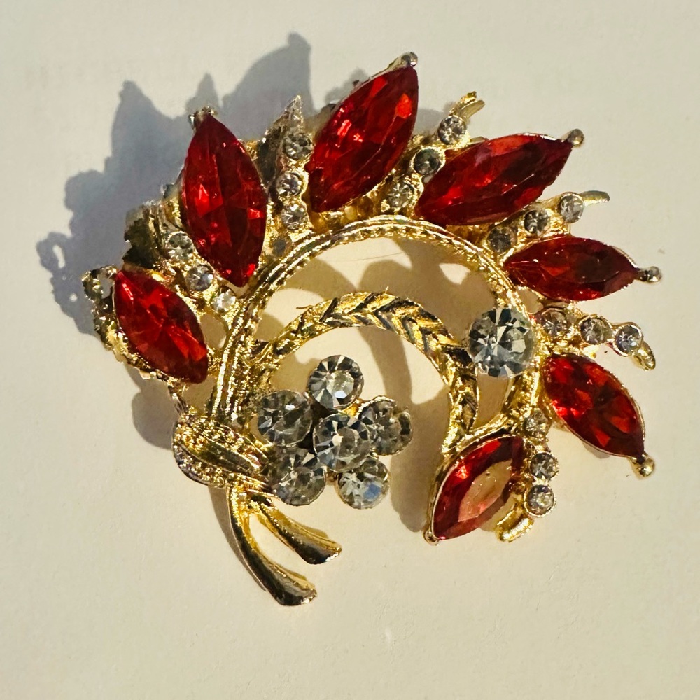 Elegant Gold and Red Brooch